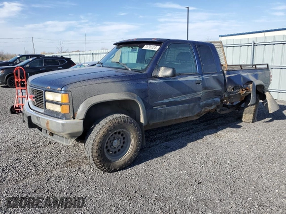 1995 GMC Sierra 1500 z VIN 2GTEK19K3S1591653, wystawiony jako Copart lot #75799124 z przebiegiem 329 311 mil mil oraz Nie do naprawy. Historia ofert i sprzedaży dostępna na DreamBid. Obrazek 1.
