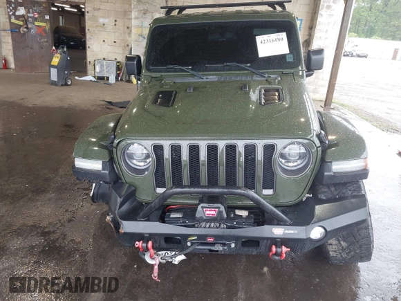2021 Jeep Wrangler Unlimited Rubicon with VIN 1C4HJXFG4MW543254, listed as a IAAI auction lot 42316180 with 50,696 mi miles and . Bid and sale history available at DreamBid. Image 12.