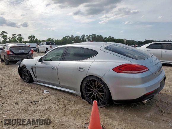 2014 Porsche Panamera с VIN WP0AA2A79EL009620, выставлен на аукционе Copart как лот 58654975 с пробегом 169 322 миль миль и Списание • Salvage title. История ставок и продаж доступна на DreamBid. Изображение 2.