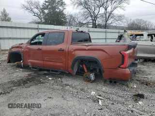 2024 Toyota Tundra TRD Pro Hybrid with VIN 5TFPC5DB6RX076616, listed as a Copart auction lot 43985855 with 7,273 mi miles and Salvage title. Bid and sale history available at DreamBid. Image 2.