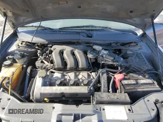 2005 Mercury Sable LS z VIN 1MEFM55S45A617102, wystawiony jako Copart lot #41788115 z przebiegiem 131 668 mil mil oraz Szkoda całkowita • Salvage title. Historia ofert i sprzedaży dostępna na DreamBid. Obrazek 11.