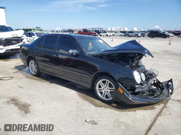 2001 Mercedes-Benz E-Class AWD with VIN WDBJF82J21X056553, listed as a Copart auction lot 73046694 with 0 mi miles and Salvage Title. Bid and sale history available at carsss.com. Image 4.