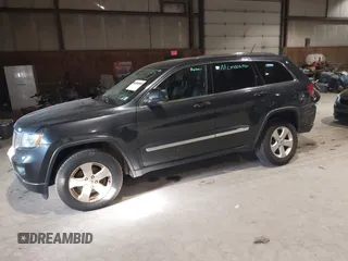 2013 Jeep Grand Cherokee Laredo with VIN 1C4RJFAG9DC583269, listed as a IAAI auction lot 41241085 with 147,995 mi miles. Bid and sale history available at carsss.com. Image 2.