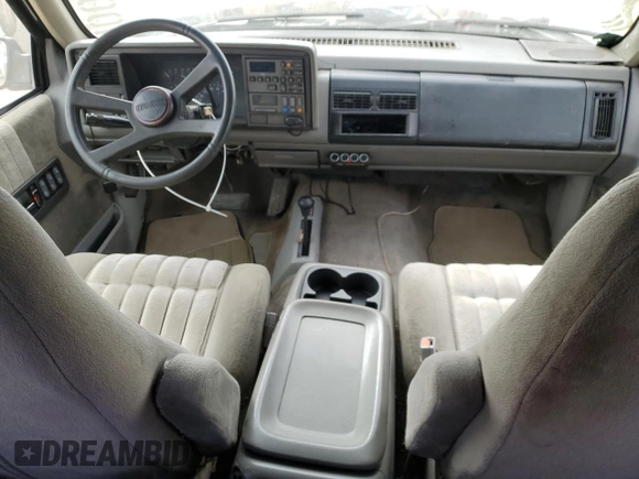 1994 GMC Sierra 1500 z VIN 2GTEK19K7R1531515, wystawiony jako Copart lot #45211685 z przebiegiem 286 840 mil mil oraz Szkoda całkowita • Salvage title. Historia ofert i sprzedaży dostępna na DreamBid. Obrazek 8.