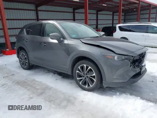 2022 Mazda CX-5 2.5 S Premium Package with VIN JM3KFBDM0N1528694, listed as a IAAI auction lot 41600589 with 42,320 mi miles. Bid and sale history available at carsss.com. Image 1.