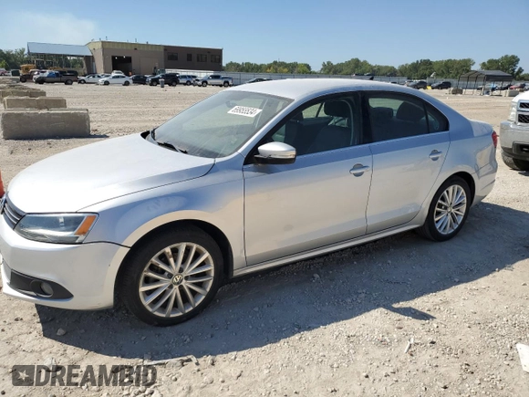 2011 Volkswagen Jetta SEL with VIN 3VWLZ7AJXBM056107, listed as a Copart auction lot 69955534 with 104,451 mi miles and Salvage title. Bid and sale history available at DreamBid. Image 1.