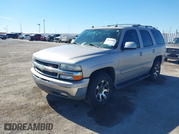 2005 Chevrolet Tahoe LT z VIN 1GNEC13T85J254296, wystawiony jako IAAI lot #41676900 z przebiegiem 214 305 mil mil oraz . Historia ofert i sprzedaży dostępna na DreamBid. Obrazek 2.