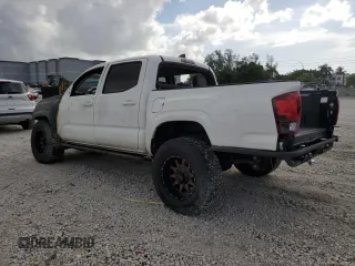 2021 Toyota Tacoma SR z VIN 3TMCZ5AN0MM411900, wystawiony jako Copart lot #58072365 z przebiegiem Nie podano mil oraz Nie do naprawy • Non repairable. Historia ofert i sprzedaży dostępna na DreamBid. Obrazek 2.