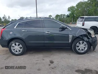 2015 Cadillac SRX with VIN 3GYFNAE30FS569009, listed as a IAAI auction lot 41718522 with 104,448 mi miles and . Bid and sale history available at DreamBid. Image 13.