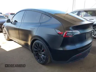 2022 Tesla Model Y Performance z VIN 7SAYGDEF0NF491586, wystawiony jako IAAI lot #42276747 z przebiegiem 117 203 mil mil oraz . Historia ofert i sprzedaży dostępna na DreamBid. Obrazek 3.