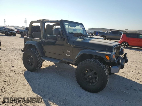 2004 Jeep Wrangler Sahara with VIN 1J4FA59S04P772756, listed as a Copart auction lot 47973495 with 92,685 mi miles and Salvage Title. Bid and sale history available at DreamBid. Image 4.