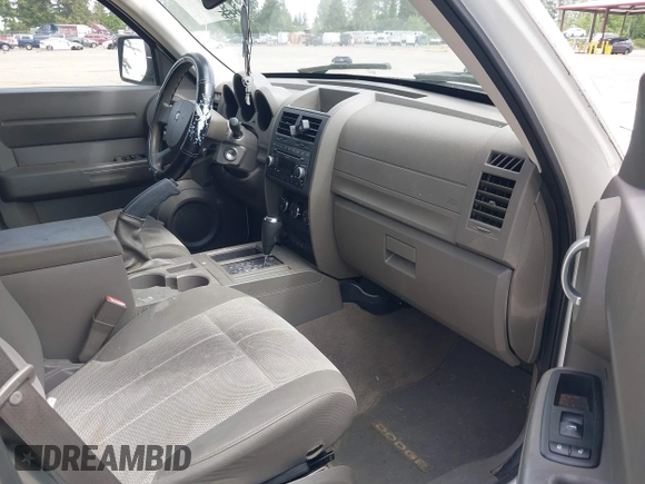 2007 Dodge Nitro SXT with VIN 1D8GT28K37W597001, listed as a IAAI auction lot 42350016 with 104,535 mi miles and . Bid and sale history available at DreamBid. Image 5.