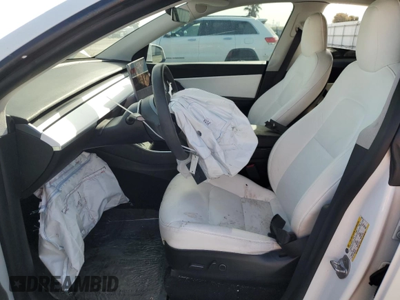 2021 Tesla Model Y Standard Range z VIN 5YJYGDED9MF110473, wystawiony jako Copart lot #53850085 z przebiegiem 46 242 mil mil oraz Szkoda całkowita • Salvage title. Historia ofert i sprzedaży dostępna na DreamBid. Obrazek 7.
