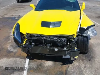 2016 Chevrolet Corvette 1LT z VIN 1G1YB2D77G5111974, wystawiony jako IAAI lot #42134341 z przebiegiem 28 287 mil mil oraz . Historia ofert i sprzedaży dostępna na DreamBid. Obrazek 6.