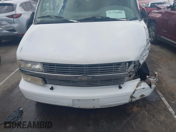 1998 Chevrolet Astro with VIN 1GNDM19W4WB103476, listed as a IAAI auction lot 41735080 with 210,293 mi miles. Bid and sale history available at carsss.com. Image 10.