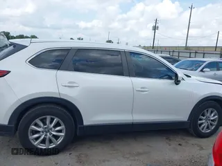 2016 Mazda CX-9 Sport z VIN JM3TCABY1G0111316, wystawiony jako IAAI lot #42085945 z przebiegiem 98 691 mil mil oraz . Historia ofert i sprzedaży dostępna na DreamBid. Obrazek 14.