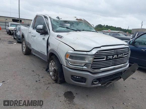 2021 Ram 2500 Laramie with VIN 3C6UR5FL7MG503085, listed as a IAAI auction lot 41937415 with 71,076 mi miles and . Bid and sale history available at DreamBid. Image 1.