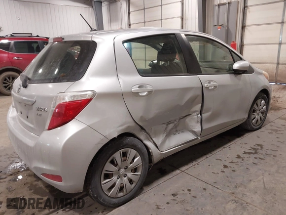 2012 Toyota Yaris L with VIN JTDKTUD34CD523773, listed as a IAAI auction lot 41616220 with 77,332 mi miles. Bid and sale history available at carsss.com. Image 4.