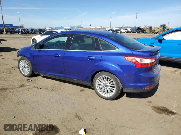 2014 Ford Focus Titanium with VIN 1FADP3J25EL304595, listed as a Copart auction lot 49573805 with 82,233 mi miles and Clean Title. Bid and sale history available at carsss.com. Image 2.