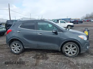 2016 Buick Encore Leather with VIN KL4CJGSB8GB545762, listed as a IAAI auction lot 41957024 with 142,216 mi miles and . Bid and sale history available at carsss.com. Image 14.