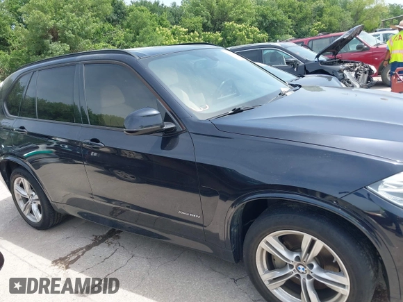 2014 BMW X5 xDrive50i with VIN 5UXKR6C55E0C03743, listed as a IAAI auction lot 42268302 with 118,892 mi miles and . Bid and sale history available at DreamBid. Image 13.