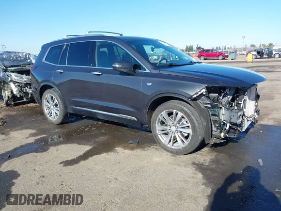 2022 Cadillac XT6 Premium Luxury with VIN 1GYKPFRS7NZ173703, listed as a IAAI auction lot 41335618 with 32,116 mi miles. Bid and sale history available at carsss.com. Image 1.