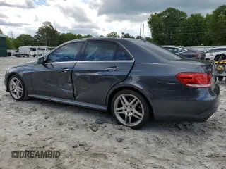 2014 Mercedes-Benz E 350 Sport with VIN WDDHF5KB9EA825975, listed as a Copart auction lot 55427505 with 134,668 mi miles and Salvage title. Bid and sale history available at DreamBid. Image 2.