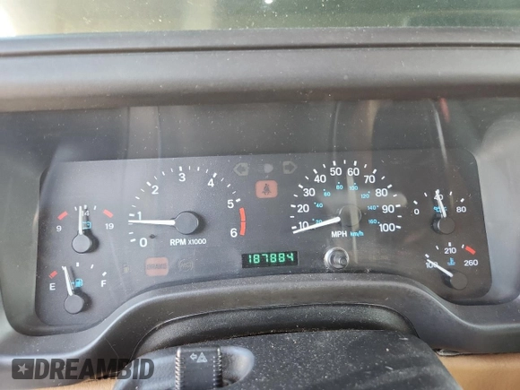 1997 Jeep Wrangler Sahara with VIN 1J4FY49S3VP519387, listed as a Copart auction lot 63822395 with 187,884 mi miles and Salvage title. Bid and sale history available at DreamBid. Image 9.
