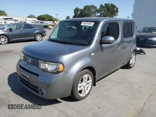 2010 Nissan Cube S z VIN JN8AZ2KRXAT158559, wystawiony jako Copart lot #58584965 z przebiegiem 192 669 mil mil oraz Szkoda całkowita • Salvage title. Historia ofert i sprzedaży dostępna na DreamBid. Obrazek 1.