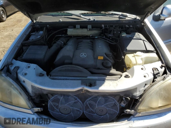 2000 Mercedes-Benz M 320/430/500 with VIN 4JGAB72E5YA173269, listed as a Copart auction lot 71520714 with 239,248 mi miles and Clean title. Bid and sale history available at DreamBid. Image 12.