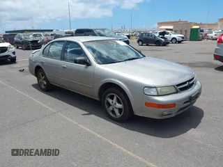 1998 Nissan Maxima GXE z VIN JN1CA21DXWT530901, wystawiony jako IAAI lot #42208103 z przebiegiem 137 947 mil mil oraz . Historia ofert i sprzedaży dostępna na DreamBid. Obrazek 1.