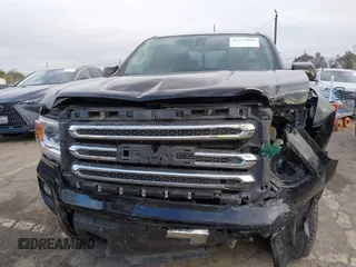 2016 GMC Canyon 4WD SLE with VIN 1GTH6CE33G1107926, listed as a IAAI auction lot 41777818 with 42,450 mi miles. Bid and sale history available at carsss.com. Image 12.