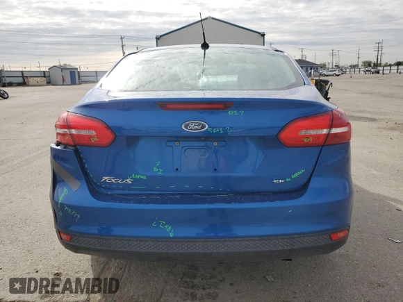 2018 Ford Focus SE z VIN 1FADP3F27JL260280, wystawiony jako Copart lot #54690975 z przebiegiem 73 322 mil mil oraz Szkoda całkowita • Salvage title. Historia ofert i sprzedaży dostępna na DreamBid. Obrazek 6.