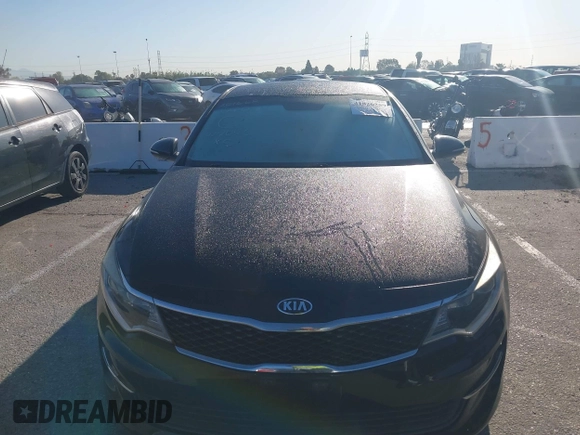 2017 Kia Optima LX with VIN 5XXGT4L30HG152700, listed as a IAAI auction lot 41826259 with 143,438 mi miles. Bid and sale history available at carsss.com. Image 12.