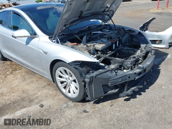 2016 Tesla Model S 90D with VIN 5YJSA1E22GF174637, listed as a IAAI auction lot 42234083 with 142,915 mi miles and . Bid and sale history available at DreamBid. Image 6.