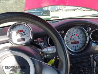 2005 MINI Convertible with VIN WMWRF33445TF62043, listed as a IAAI auction lot 42279363 with 173,067 mi miles and . Bid and sale history available at DreamBid. Image 7.