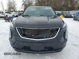 2022 Cadillac XT4 FWD Luxury z VIN 1GYAZAR48NF163967, wystawiony jako Copart lot #43148925 z przebiegiem 58 788 mil mil oraz Czysty tytuł • Clean title. Historia ofert i sprzedaży dostępna na DreamBid. Obrazek 5.