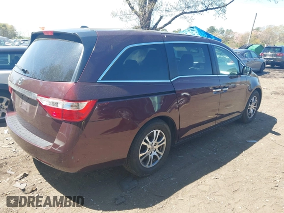 2011 Honda Odyssey EX-L with VIN 5FNRL5H69BB093996, listed as a IAAI auction lot 42151381 with 88,531 mi miles and . Bid and sale history available at carsss.com. Image 4.
