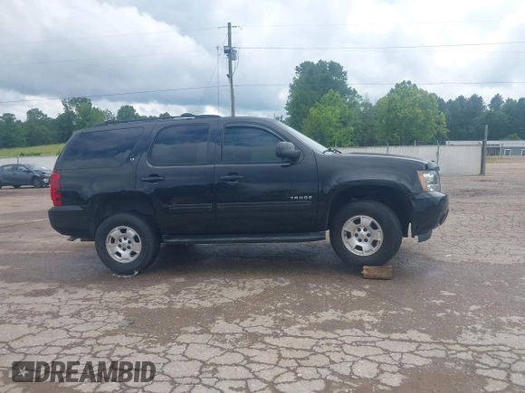 2014 Chevrolet Tahoe LT z VIN 1GNSKBE02ER133795, wystawiony jako IAAI lot #42335322 z przebiegiem 217 292 mil mil oraz . Historia ofert i sprzedaży dostępna na DreamBid. Obrazek 13.