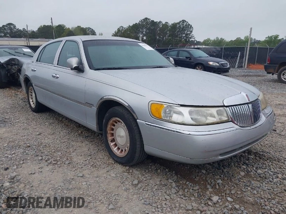 2001 Lincoln Town Car Executive with VIN 1LNHM81W91Y684733, listed as a IAAI auction lot 41949151 with 136,356 mi miles and . Bid and sale history available at DreamBid. Image 1.