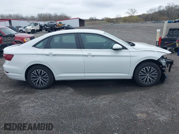 2021 Volkswagen Jetta S z VIN 3VWC57BU7MM098161, wystawiony jako IAAI lot #41954687 z przebiegiem 42 161 mil mil oraz . Historia ofert i sprzedaży dostępna na DreamBid. Obrazek 14.