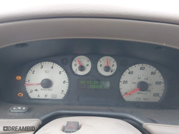 2004 Ford Taurus SEL with VIN 1FAHP56S44A129658, listed as a IAAI auction lot 41381122 with 298,335 mi miles. Bid and sale history available at carsss.com. Image 7.