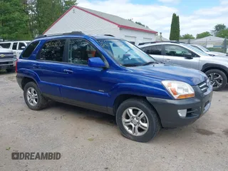 2005 Kia Sportage LX z VIN KNDJE723657074723, wystawiony jako IAAI lot #42372967 z przebiegiem 105 934 mil mil oraz . Historia ofert i sprzedaży dostępna na DreamBid. Obrazek 14.