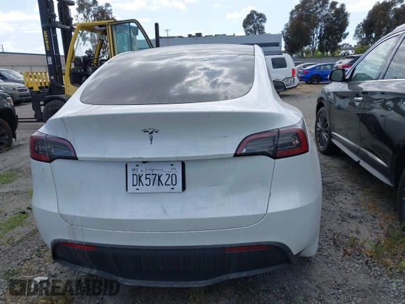 2024 Tesla Model Y with VIN 7SAYGDED2RF207783, listed as a IAAI auction lot 41758143 with Not Provided miles and . Bid and sale history available at DreamBid. Image 16.