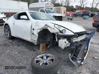 2012 Nissan 370Z Touring with VIN JN1AZ4EH4CM565125, listed as a IAAI auction lot 41630602 with 121,823 mi miles. Bid and sale history available at carsss.com. Image 1.