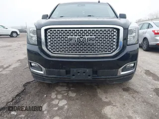 2017 GMC Yukon XL Denali with VIN 1GKS2HKJ2HR310377, listed as a IAAI auction lot 41153582 with 130,194 mi miles. Bid and sale history available at carsss.com. Image 13.