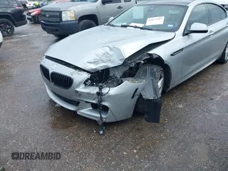 2015 BMW 6 Series 640i z VIN WBA6A0C51FD318982, wystawiony jako IAAI lot #41875547 z przebiegiem 60 968 mil mil oraz . Historia ofert i sprzedaży dostępna na DreamBid. Obrazek 21.
