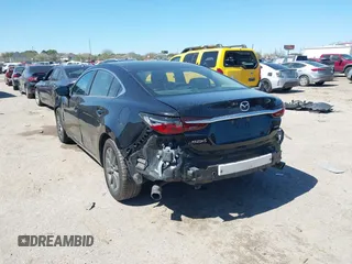 2020 Mazda 6 Sport with VIN JM1GL1UM2L1519932, listed as a IAAI auction lot 41712367 with 83,497 mi miles and . Bid and sale history available at DreamBid. Image 3.
