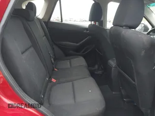 2015 Mazda CX-5 Sport z VIN JM3KE2BE9F0452625, wystawiony jako IAAI lot #42114867 z przebiegiem 167 849 mil mil oraz . Historia ofert i sprzedaży dostępna na DreamBid. Obrazek 8.