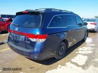2016 Honda Odyssey Touring Elite with VIN 5FNRL5H98GB083221, listed as a IAAI auction lot 41626604 with 145,341 mi miles. Bid and sale history available at carsss.com. Image 4.